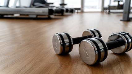 Gym equipment and dumbbells in the gym