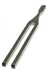 vintage tuning fork isolated on white background