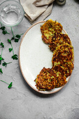 Zucchini pancakes with pike caviar