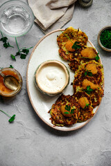 Zucchini pancakes with pike caviar