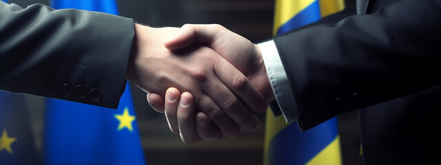 The flags of Ukraine and the EU against the background of representatives' handshakes