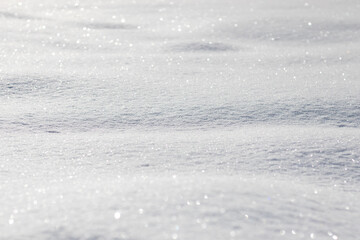 snow, a close-up view of a fresh frozen blanket of snow