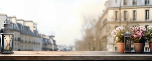 Beautiful blooms in rustic pots on a table with a sunny Paris street in soft focus, banner, design...