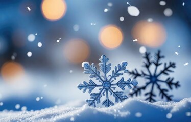 Beautiful decorative snowflakes in the snow against a blue natural background with falling snow and bokeh. Christmas winter background for design