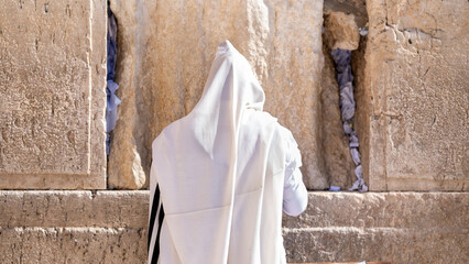 Undefined orthodox jewish man pray at the Western Wall. Jerusalem - 690950127