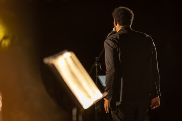 Singer's Silhouette in Night Concert