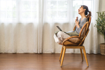Obraz premium Woman use smartphone playing, shopping, social media communication and digital online, work, online social media, online marketing, technology, chat, post, like, follow on phone screen at home.