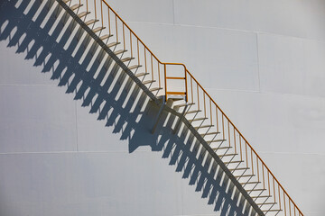 Spiral Staircase on Storage fuel Tank with sunlight