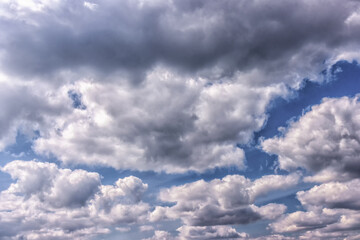 Beautiful Sky Background with Fluffy Cumulus Clouds on a Sunny Day