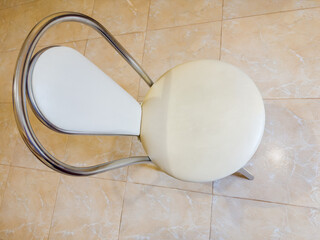 Metal chair with leatherette seat and back-rest, top view