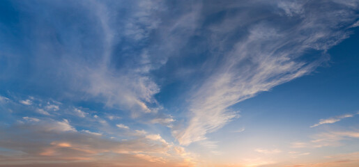 Panorama of the sky with cirrus clouds at sunset - obrazy, fototapety, plakaty