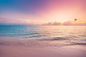 Inspirational ocean beach sunset. Colorful sunny sky clouds. Calm peaceful sea waves soft sand meditation positive energy coast. Paradise tropical beach summer tranquil seascape. Relax best vacation