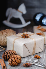 Composition with Christmas present  on a wooden background. Vertical image.