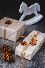 Composition with Christmas present  on a wooden background. Vertical image.