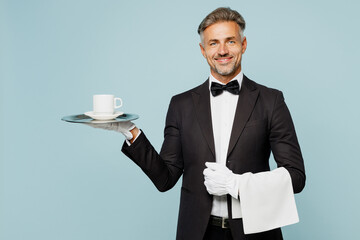 Adult barista male waiter butler man wear shirt black suit bow tie elegant uniform hold towel metal...