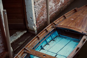 old boat in canal of Venice
