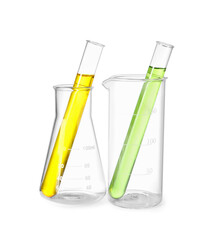 Glass flask, beaker and test tubes with colorful liquids isolated on white