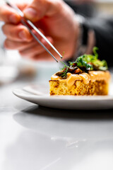 chef decorated plate with food