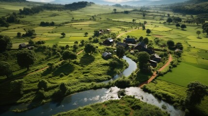 An aerial view of a farm integrated into a natural landscape, emphasizing the importance of biodiversity.