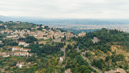 Fototapeta na wymiar Florence, Italy. Fiesole is a city in the Tuscany region, in the province of Florence. The city of Florence in the background of the panorama, Aerial View