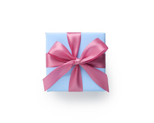 Top view of blue gift box with pink ribbon bow isolated on white background
