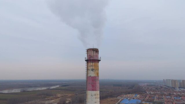 Aerial photography of smoke trees at heating station in winter