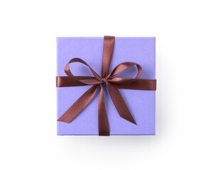 Top view of blue gift box with purple ribbon bow isolated on white background