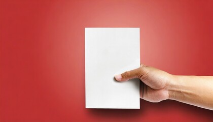 Close-up photo of a hand holding ballot paper for election. Voting concept.