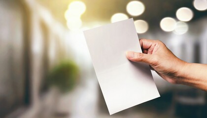 Obraz premium Close-up photo of a hand holding ballot paper for election. Voting concept.