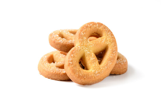 Danish butter cookies macro cutout. whole pretzel biscuits with sugar isolated on white
