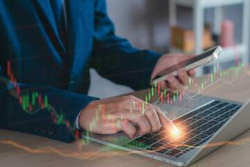 Stock market graph analysis concept. Broker planning strategy for investment in stock, forex, financial, index fund, exchange rate high risk to high profit. Digital business technology analyze data.