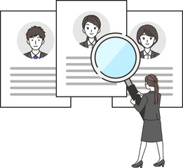 履歴書をチェックする女性