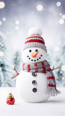 Obraz premium Happy snowman in winter scenery. Close-up shot, winter bokeh background.