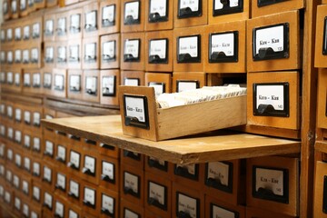 Closeup view of library card catalog drawers