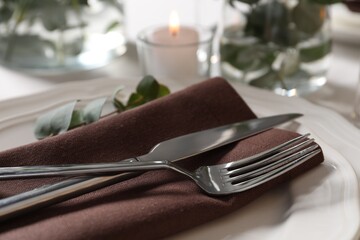 Beautiful table setting with silverware, closeup view
