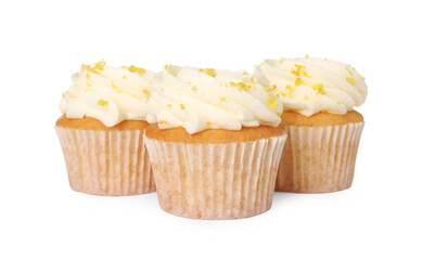 Delicious cupcakes with cream and lemon zest isolated on white