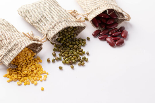 Red beans, soybeans, green beans in burlap bags