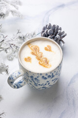 Coffee in a light cup, close up