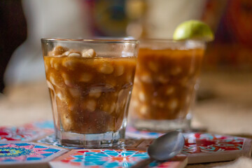 Egyptian drink that consists of tomato broth and chickpeas 
Chickpeas soup, Chickpeas drink, Hummus elsham, Halabesa