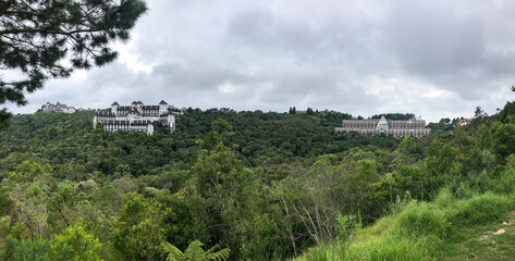 Landscape with forest in the background with European style castle in the city of Campos de Jordão
