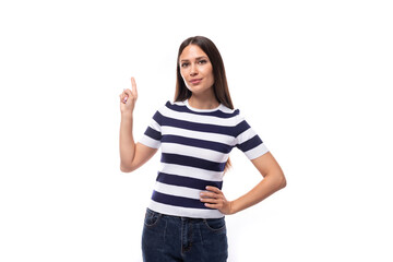 joyful young european promoter woman with black straight hair in a striped black and white t-shirt and jeans