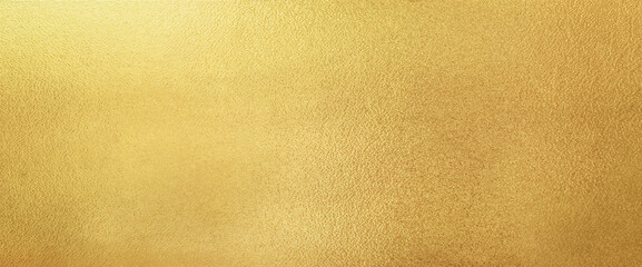 Gold wall texture background. Yellow shiny gold paint on concrete wall surface, vibrant golden luxury wallpaper, horizontal - obrazy, fototapety, plakaty