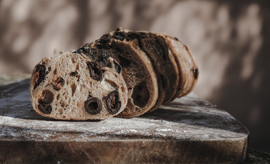 The Cutting French Olive baguette. Outdoor. Shadow. Copy space.