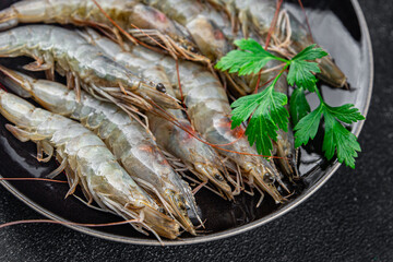 shrimp raw prawn seafood fresh eating cooking appetizer meal food snack on the table copy space food background rustic top view Pescetarian