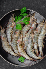 shrimp raw prawn seafood fresh eating cooking appetizer meal food snack on the table copy space food background rustic top view Pescetarian