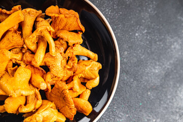 mushroom chanterelle fresh food tasty mushrooms snack on the table copy space food background rustic top view