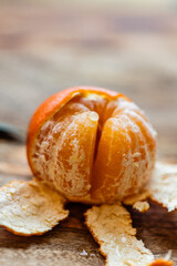 Close up of a half peeled mandarin orange