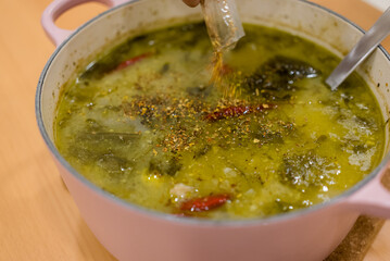 Boiled fish with pickled cabbage and chili