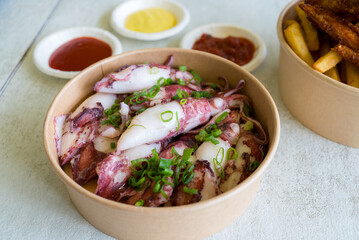 Fresh boiled squid in the paper box