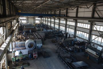 Metalworking factory production line. Manufactured metal parts